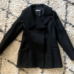 Jill Sander black wool coat. Made in Italy. Size 38.